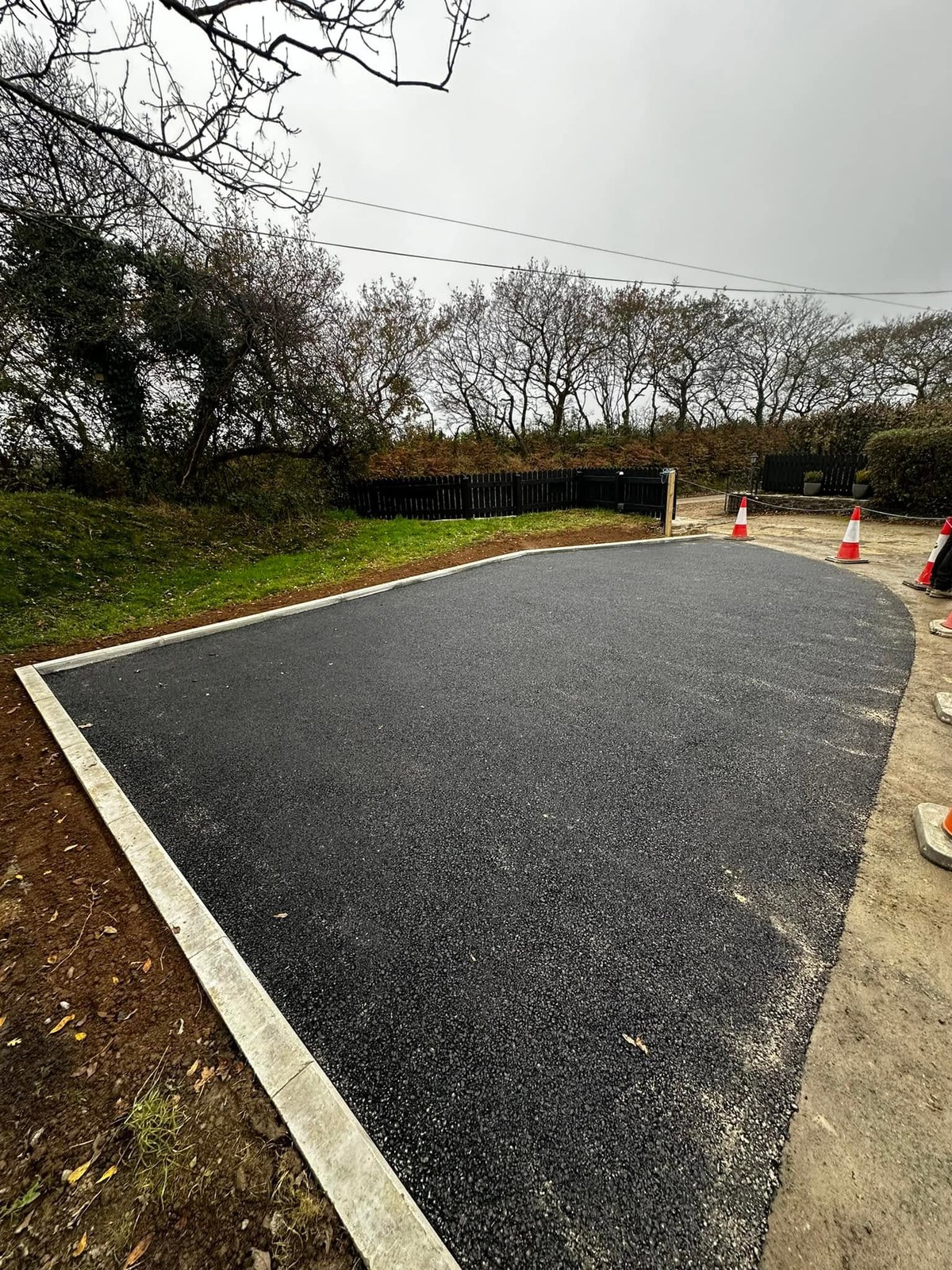 Surfaced residential driveway with a pale edging border
